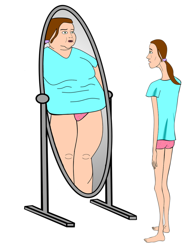 Frau vor dem Spiegel betrachtet ihr Spiegelbild und sieht übergewichtige Person.
